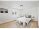 Bright bedroom featuring great natural light, laminate flooring, and neutral paint at 2293 S Sherman St, Denver, CO 80210