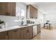 Bright kitchen with stainless steel appliances, modern cabinets, and white countertops at 2293 S Sherman St, Denver, CO 80210