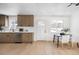 Modern kitchen featuring wood cabinets, white countertops, and stainless steel appliances at 2293 S Sherman St, Denver, CO 80210