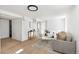 Spacious living room showcasing an open layout, neutral decor, and great natural light with seamless flooring at 2293 S Sherman St, Denver, CO 80210