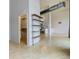 Open floor plan view into bedroom closet and floating shelves at 3100 Huron St # 4N, Denver, CO 80202