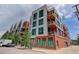 Apartment complex exterior shot showcasing modern architecture and multiple balconies at 3100 Huron St # 4N, Denver, CO 80202