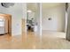 Open living space with high ceilings, hardwood floors, and modern kitchen, perfect for entertaining at 3100 Huron St # 4N, Denver, CO 80202