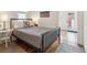 Bedroom featuring hardwood floors and a cozy bed at 3329 N High St, Denver, CO 80205