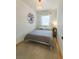 Bright bedroom featuring natural lighting and a decorative wall at 3329 N High St, Denver, CO 80205