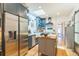 Charming kitchen featuring stainless steel appliances, an island, and skylight at 3329 N High St, Denver, CO 80205