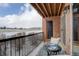 Balcony with views, black railing and bistro set at 4899 S Dudley St # 5H, Littleton, CO 80123