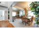 Bright dining room with hardwood floors and a chandelier at 6515 S Killarney Ct, Aurora, CO 80016