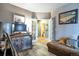 View down a hallway showing access to the bathroom and other rooms at 6515 S Killarney Ct, Aurora, CO 80016