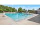 Inviting community pool with plenty of lounge chairs at 6515 S Killarney Ct, Aurora, CO 80016