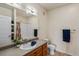 Bathroom featuring a shower and vanity at 4100 Albion St # 424, Denver, CO 80216