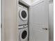 Convenient in-unit laundry closet with stacked washer and dryer at 4100 Albion St # 424, Denver, CO 80216