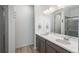 Bathroom boasts double vanity, modern fixtures, and a large shower at 27728 E 10Th Dr, Aurora, CO 80018