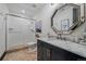 Beautiful bathroom with a modern vanity and glass shower at 5085 Knobcone Dr, Castle Rock, CO 80108