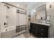 Bathroom features a tub and shower with white subway tiles at 5085 Knobcone Dr, Castle Rock, CO 80108