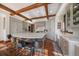A bright, modern kitchen with marble counters, gray cabinets, and hardwood floors at 5085 Knobcone Dr, Castle Rock, CO 80108