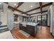 A spacious kitchen with a large island, modern appliances, and hardwood floors at 5085 Knobcone Dr, Castle Rock, CO 80108