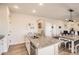 Spacious kitchen island features stainless steel appliances and granite countertops at 4746 River Highlands Loop, Elizabeth, CO 80107