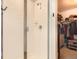 Clean shower and closet featuring shelving and rods at 4746 River Highlands Loop, Elizabeth, CO 80107