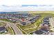 Aerial view of home in community near water at 27608 E Ottawa Ave, Aurora, CO 80016