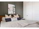 Comfortable bedroom features stylish decor, soft lighting, and a serene atmosphere at 27608 E Ottawa Ave, Aurora, CO 80016