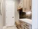 Functional mudroom with custom cabinetry, practical design, and ample storage options at 27608 E Ottawa Ave, Aurora, CO 80016