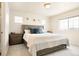 Bright bedroom with large windows and soft, neutral decor at 320 Marshall Mews, Superior, CO 80027