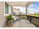 Relaxing front porch seating area with comfortable furnishings, perfect for enjoying the outdoors at 320 Marshall Mews, Superior, CO 80027