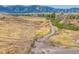 Expansive land featuring mountain views and a winding dirt path for outdoor adventures at 320 Marshall Mews, Superior, CO 80027