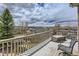 Enjoy mountain views from this home's deck, perfect for relaxing and outdoor entertainment at 815 Concho Ct, Castle Rock, CO 80104