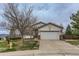 Charming single Gathering home featuring a driveway, two-car garage and mature landscaping at 815 Concho Ct, Castle Rock, CO 80104