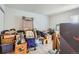 Unfinished basement offers potential for customization and additional storage space at 940 S Peoria St, Aurora, CO 80012