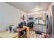 Updated kitchen with stainless steel appliances and neutral cabinets in a bright, eat-in space at 940 S Peoria St, Aurora, CO 80012