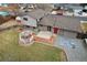 Aerial view highlighting the home's backyard deck and patio area at 327 S 29Th Ave, Brighton, CO 80601