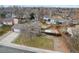 Aerial home view, showcasing a spacious backyard and a driveway at 327 S 29Th Ave, Brighton, CO 80601