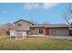 House exterior and backyard with deck and patio at 327 S 29Th Ave, Brighton, CO 80601