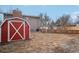 Red shed in the backyard next to the house at 327 S 29Th Ave, Brighton, CO 80601