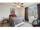 Bedroom with ceiling fan and large window at 327 S 29Th Ave, Brighton, CO 80601