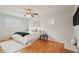 Bright bedroom with hardwood floors and ceiling fan at 327 S 29Th Ave, Brighton, CO 80601