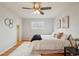 Well-lit bedroom with hardwood floors and ceiling fan at 327 S 29Th Ave, Brighton, CO 80601