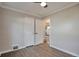 Bedroom featuring wood floors and a closet at 4441 Elm Ct, Denver, CO 80211
