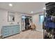 Spacious walk-in closet with ample storage, and a vanity with good lighting at 4441 Elm Ct, Denver, CO 80211