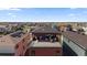 Aerial view of the rooftop deck, showcasing its layout and the surrounding neighborhood at 6047 N Nepal Ct, Aurora, CO 80019