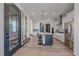 Elegant kitchen with an island, pendant lighting, and stainless steel appliances at 6047 N Nepal Ct, Aurora, CO 80019