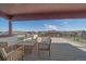 Spacious rooftop deck with comfortable seating and panoramic views of the surrounding area at 6047 N Nepal Ct, Aurora, CO 80019