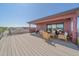 Open rooftop deck featuring outdoor furniture, perfect for enjoying sunsets and entertaining guests at 6047 N Nepal Ct, Aurora, CO 80019