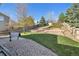 Landscaped backyard with a patio, terraced levels, and lush green lawn at 2905 E Yarrow Cir, Superior, CO 80027