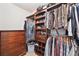 Spacious closet with plenty of shelves, rods and dresser for maximum storage at 2905 E Yarrow Cir, Superior, CO 80027