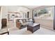 Spacious living room showcasing an open floor plan with a view into the bright kitchen at 2905 E Yarrow Cir, Superior, CO 80027