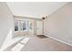 Bright living room with bay window and neutral carpet at 2905 E Yarrow Cir, Superior, CO 80027